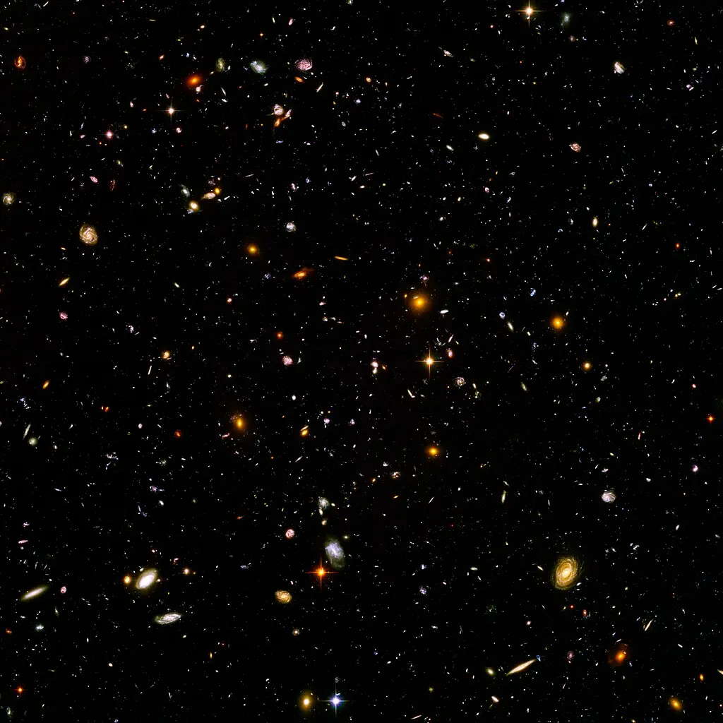 Campo Profundo del Hubble. NASA y la Agencia Espacial Europea. (Editado por Noodle snacks, dominio público, vía Wikimedia Commons).
