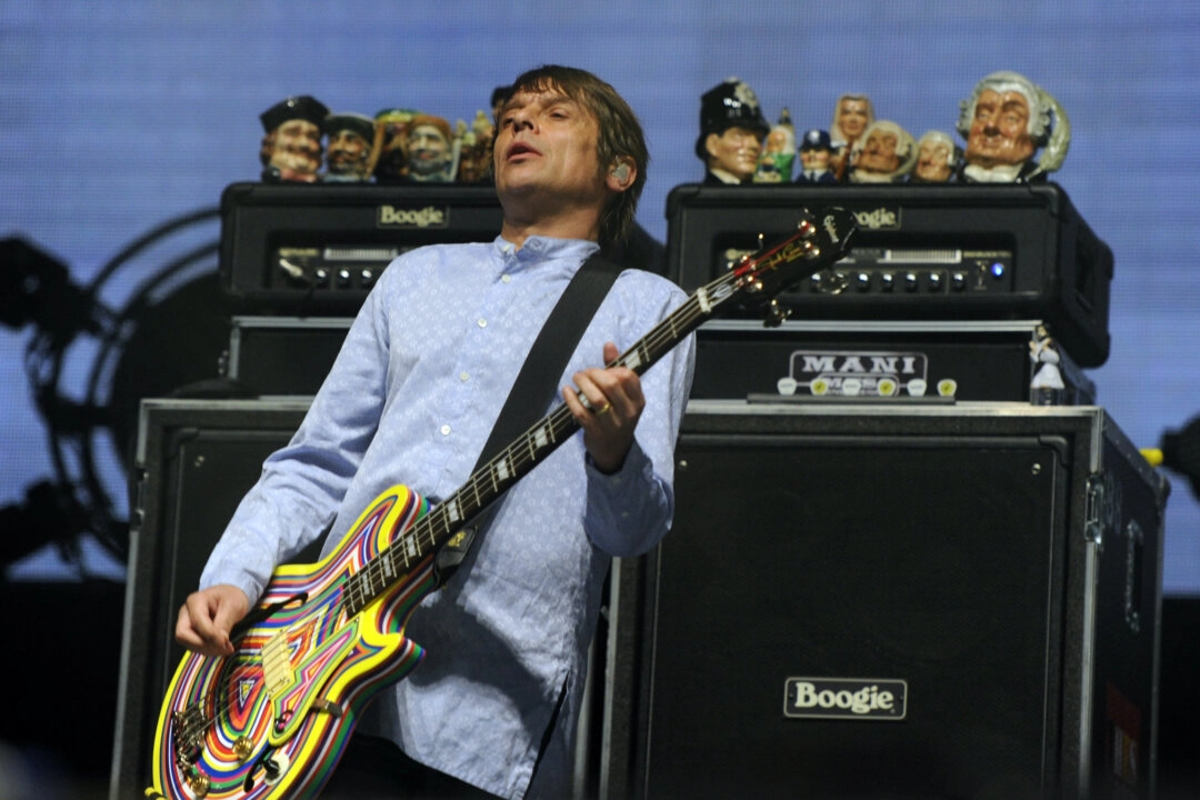 <em>El cantante Gary Mounfield de la banda The Stone Roses se presenta en el escenario durante el primer día del Coachella Valley Music & Arts Festival 2013 en el Empire Polo Club en Indio, California, el 12 de abril de 2013. (Kevin Winter/Getty Images para Coachella)</em>